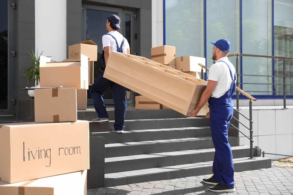 Professional Movers Loading A Truck